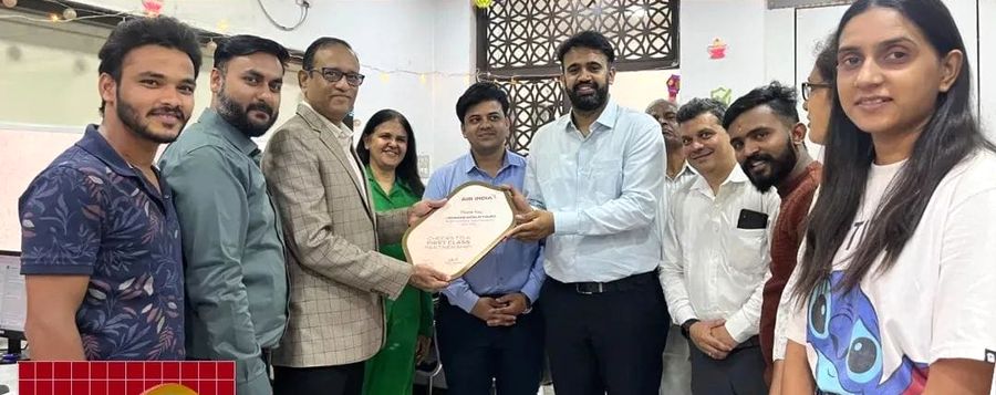 The Leonard team receiving Air India’s partnership award at our office